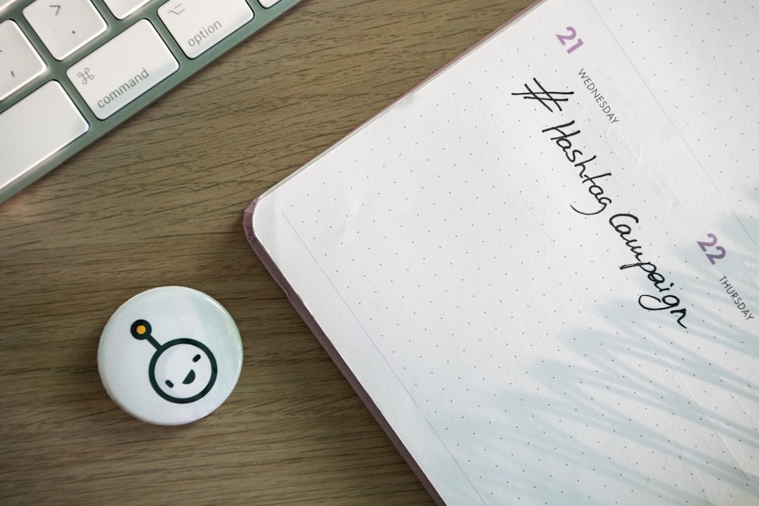 Wellbeing habit tracking journals on a wooden desk